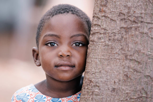 The Smile Behind the Tree